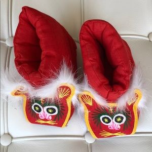 Red asian baby shoes approximately 5.5 inches long